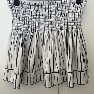 Lucky in Love White Mini tennis Skirt with Black Stripe Print